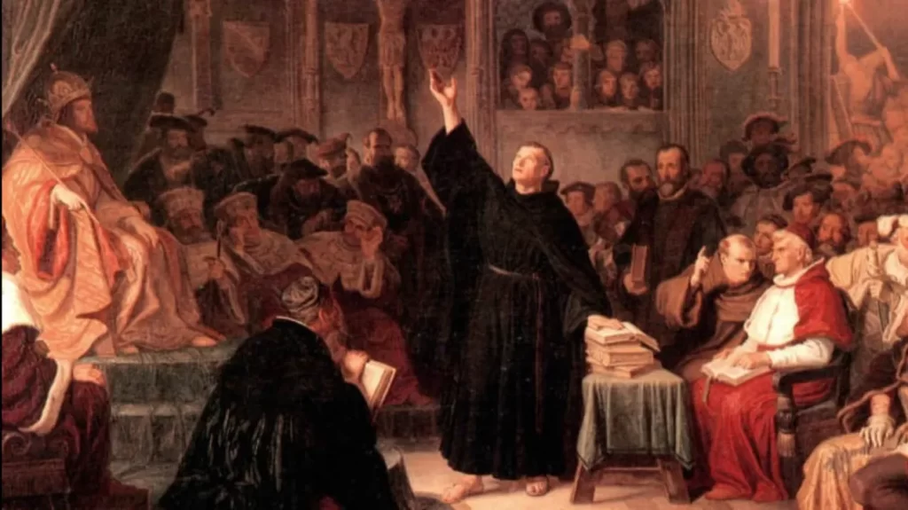 Martin Luther defending himself before Emperor Charles V and representative of the Pope at the Diet of Worms