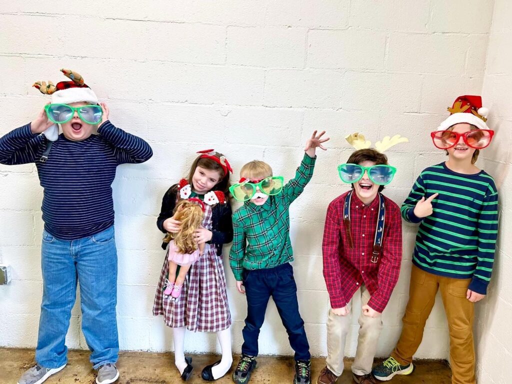 Children showing holiday cheer